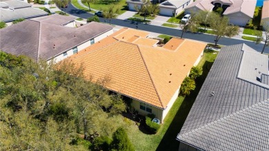Former Model home.  With a Life in VALENCIA LAKES, one of on Caloosa Greens Executive Golf Course in Florida - for sale on GolfHomes.com, golf home, golf lot
