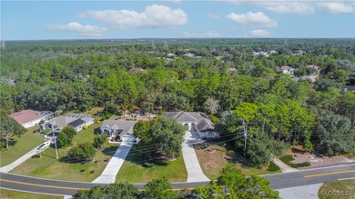 Value-Packed Cypress Village Pool Home with Endless Entertaining on Sugarmill Woods Golf and Country Club in Florida - for sale on GolfHomes.com, golf home, golf lot