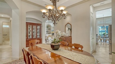 Welcome home to this beautifully updated three-bedroom residence on Lakewood Ranch Golf and Country Club in Florida - for sale on GolfHomes.com, golf home, golf lot