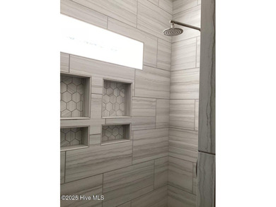 Contemporary tidal home built in 2020. Move-in-ready! Only home on Cypress Landing Golf Club in North Carolina - for sale on GolfHomes.com, golf home, golf lot