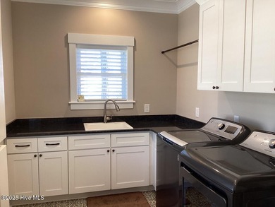 Contemporary tidal home built in 2020. Move-in-ready! Only home on Cypress Landing Golf Club in North Carolina - for sale on GolfHomes.com, golf home, golf lot