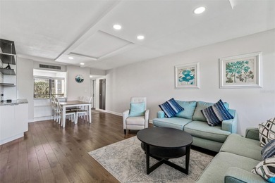 Welcome to this stunning, move-in-ready, FULLY FURNISHED dream on Cove Cay Country Club in Florida - for sale on GolfHomes.com, golf home, golf lot