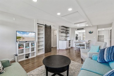 Welcome to this stunning, move-in-ready, FULLY FURNISHED dream on Cove Cay Country Club in Florida - for sale on GolfHomes.com, golf home, golf lot