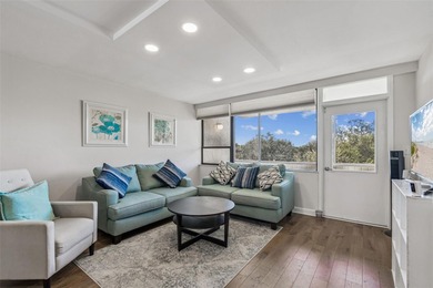 Welcome to this stunning, move-in-ready, FULLY FURNISHED dream on Cove Cay Country Club in Florida - for sale on GolfHomes.com, golf home, golf lot