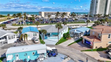 Gorgeous, light-filled open concept single story frame stucco on Island Dunes Country Club in Florida - for sale on GolfHomes.com, golf home, golf lot