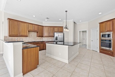 Welcome home to 25515 Hawks Run Lane! SLATE TILE ROOF REPLACED on Red Tail Golf Club in Florida - for sale on GolfHomes.com, golf home, golf lot