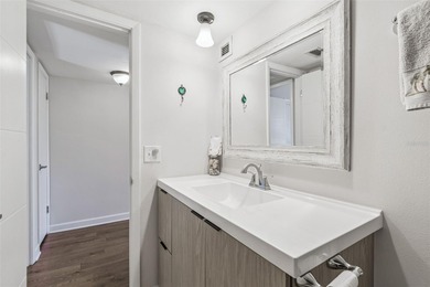 Welcome to this stunning, move-in-ready, FULLY FURNISHED dream on Cove Cay Country Club in Florida - for sale on GolfHomes.com, golf home, golf lot