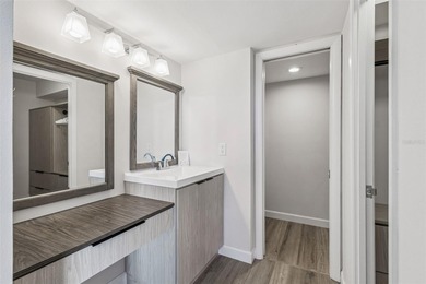 Welcome to this stunning, move-in-ready, FULLY FURNISHED dream on Cove Cay Country Club in Florida - for sale on GolfHomes.com, golf home, golf lot