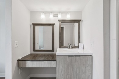 Welcome to this stunning, move-in-ready, FULLY FURNISHED dream on Cove Cay Country Club in Florida - for sale on GolfHomes.com, golf home, golf lot