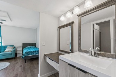 Welcome to this stunning, move-in-ready, FULLY FURNISHED dream on Cove Cay Country Club in Florida - for sale on GolfHomes.com, golf home, golf lot