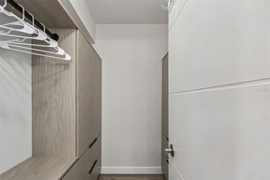 Welcome to this stunning, move-in-ready, FULLY FURNISHED dream on Cove Cay Country Club in Florida - for sale on GolfHomes.com, golf home, golf lot