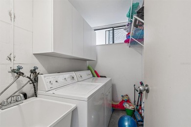 Welcome to this stunning, move-in-ready, FULLY FURNISHED dream on Cove Cay Country Club in Florida - for sale on GolfHomes.com, golf home, golf lot