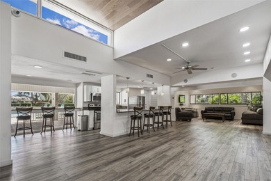 Welcome to this stunning, move-in-ready, FULLY FURNISHED dream on Cove Cay Country Club in Florida - for sale on GolfHomes.com, golf home, golf lot