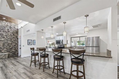 Welcome to this stunning, move-in-ready, FULLY FURNISHED dream on Cove Cay Country Club in Florida - for sale on GolfHomes.com, golf home, golf lot