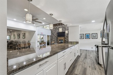 Welcome to this stunning, move-in-ready, FULLY FURNISHED dream on Cove Cay Country Club in Florida - for sale on GolfHomes.com, golf home, golf lot