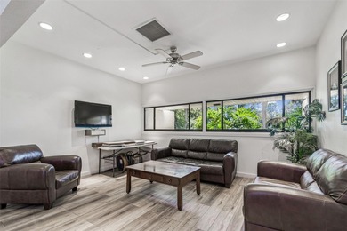 Welcome to this stunning, move-in-ready, FULLY FURNISHED dream on Cove Cay Country Club in Florida - for sale on GolfHomes.com, golf home, golf lot