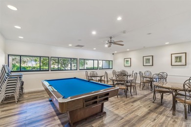 Welcome to this stunning, move-in-ready, FULLY FURNISHED dream on Cove Cay Country Club in Florida - for sale on GolfHomes.com, golf home, golf lot