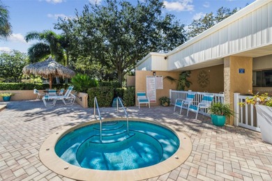 Welcome to this stunning, move-in-ready, FULLY FURNISHED dream on Cove Cay Country Club in Florida - for sale on GolfHomes.com, golf home, golf lot