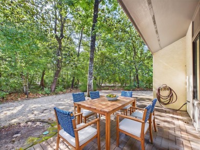 Secluded and beautifully updated, this charming 2-bedroom on Fairway Oaks at Magnolia Golf Course in Florida - for sale on GolfHomes.com, golf home, golf lot