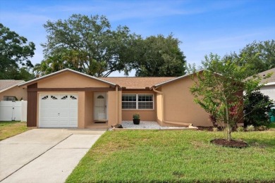 Step into this thoughtfully updated 3-bedroom, 2-bathroom home on Cove Cay Country Club in Florida - for sale on GolfHomes.com, golf home, golf lot