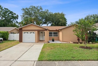 Step into this thoughtfully updated 3-bedroom, 2-bathroom home on Cove Cay Country Club in Florida - for sale on GolfHomes.com, golf home, golf lot