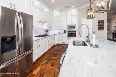 Located in the sought-after, golf cart friendly, St Johns Golf & on St. Johns Golf and Country Club in Florida - for sale on GolfHomes.com, golf home, golf lot