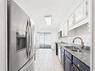 Secluded and beautifully updated, this charming 2-bedroom on Fairway Oaks at Magnolia Golf Course in Florida - for sale on GolfHomes.com, golf home, golf lot
