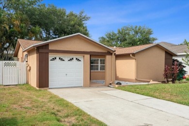 Step into this thoughtfully updated 3-bedroom, 2-bathroom home on Cove Cay Country Club in Florida - for sale on GolfHomes.com, golf home, golf lot