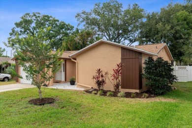 Step into this thoughtfully updated 3-bedroom, 2-bathroom home on Cove Cay Country Club in Florida - for sale on GolfHomes.com, golf home, golf lot