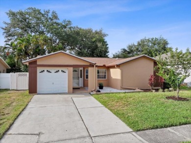 Step into this thoughtfully updated 3-bedroom, 2-bathroom home on Cove Cay Country Club in Florida - for sale on GolfHomes.com, golf home, golf lot