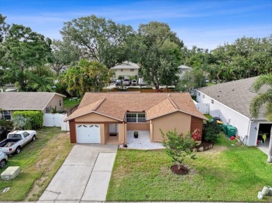 Step into this thoughtfully updated 3-bedroom, 2-bathroom home on Cove Cay Country Club in Florida - for sale on GolfHomes.com, golf home, golf lot