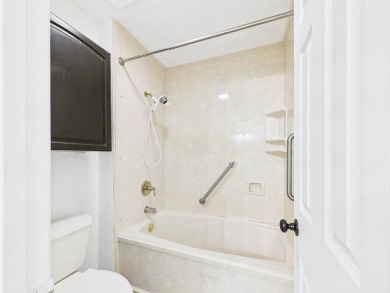 Secluded and beautifully updated, this charming 2-bedroom on Fairway Oaks at Magnolia Golf Course in Florida - for sale on GolfHomes.com, golf home, golf lot