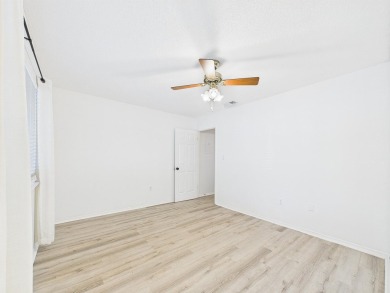 Secluded and beautifully updated, this charming 2-bedroom on Fairway Oaks at Magnolia Golf Course in Florida - for sale on GolfHomes.com, golf home, golf lot