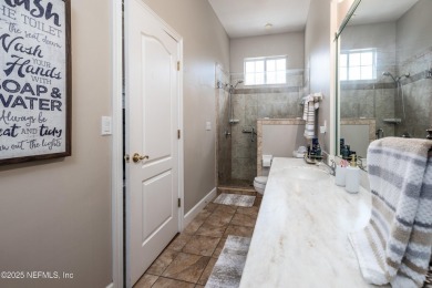 Located in the sought-after, golf cart friendly, St Johns Golf & on St. Johns Golf and Country Club in Florida - for sale on GolfHomes.com, golf home, golf lot