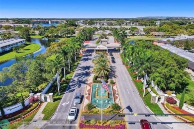 Stunning Corner Unit in Wynmoor! Experience luxurious living in on Wynmoor Golf Course in Florida - for sale on GolfHomes.com, golf home, golf lot