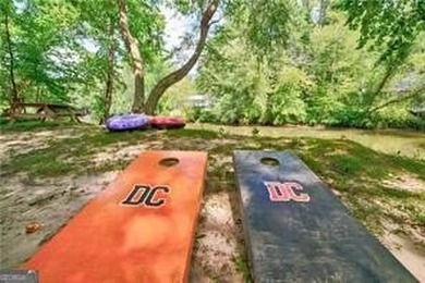 Riverfront living at it's finest with 110 feet of river frontage on White Path Golf Club in Georgia - for sale on GolfHomes.com, golf home, golf lot