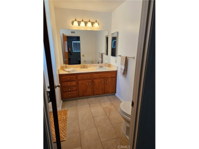Comfortable retirement living awaits in this almost 1200 square on Panorama Village Golf Course in California - for sale on GolfHomes.com, golf home, golf lot