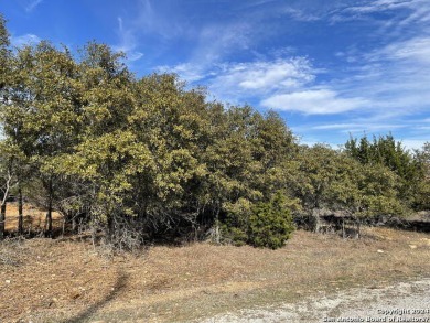 Beautiful level lot located in Rockin' J Ranch that backs up to on Vaaler Creek Golf Club in Texas - for sale on GolfHomes.com, golf home, golf lot