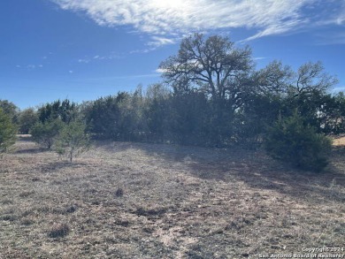 Beautiful level lot located in Rockin' J Ranch that backs up to on Vaaler Creek Golf Club in Texas - for sale on GolfHomes.com, golf home, golf lot