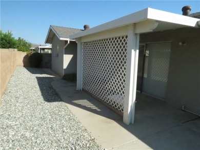 Comfortable retirement living awaits in this almost 1200 square on Panorama Village Golf Course in California - for sale on GolfHomes.com, golf home, golf lot