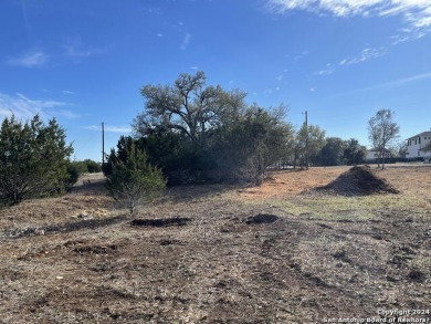 Beautiful level lot located in Rockin' J Ranch that backs up to on Vaaler Creek Golf Club in Texas - for sale on GolfHomes.com, golf home, golf lot