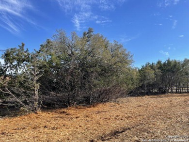 Beautiful level lot located in Rockin' J Ranch that backs up to on Vaaler Creek Golf Club in Texas - for sale on GolfHomes.com, golf home, golf lot