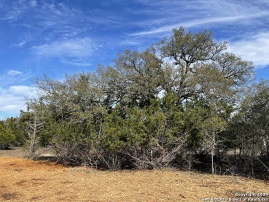 Beautiful level lot located in Rockin' J Ranch that backs up to on Vaaler Creek Golf Club in Texas - for sale on GolfHomes.com, golf home, golf lot