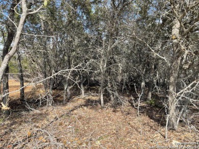Beautiful level lot located in Rockin' J Ranch that backs up to on Vaaler Creek Golf Club in Texas - for sale on GolfHomes.com, golf home, golf lot