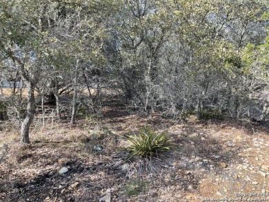 Beautiful level lot located in Rockin' J Ranch that backs up to on Vaaler Creek Golf Club in Texas - for sale on GolfHomes.com, golf home, golf lot