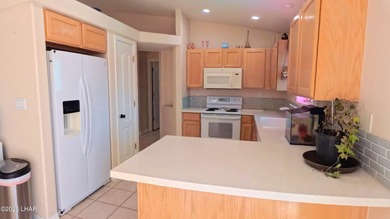 Beautiful south-side home with all the Havasu must haves on a on London Bridge Golf Course in Arizona - for sale on GolfHomes.com, golf home, golf lot