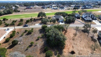 Beautiful level lot located in Rockin' J Ranch that backs up to on Vaaler Creek Golf Club in Texas - for sale on GolfHomes.com, golf home, golf lot