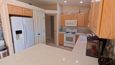 Beautiful south-side home with all the Havasu must haves on a on London Bridge Golf Course in Arizona - for sale on GolfHomes.com, golf home, golf lot