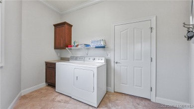 Get ready to tee up your dream lifestyle with this stunning golf on Osage National Golf Club in Missouri - for sale on GolfHomes.com, golf home, golf lot
