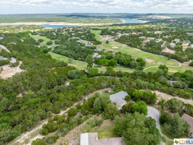 Buildable lot overlooking the golf course in highly desirable on Lago Vista Golf Club in Texas - for sale on GolfHomes.com, golf home, golf lot